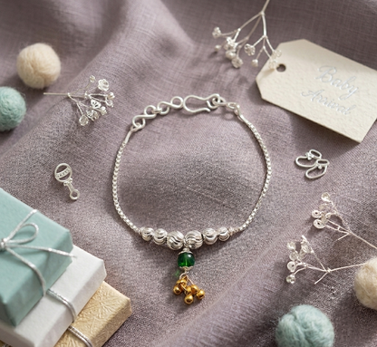 Silver Baby Shower Rakhi with Green Crystal